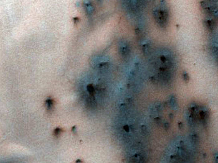 The creation of "fans" around dunes may help scientists understand seasonal changes on Mars.