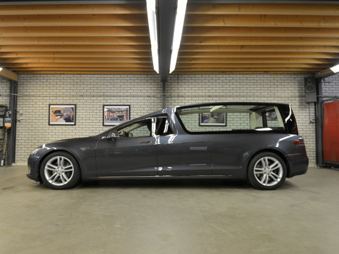 2. And a Dutch company transformed a Tesla Model S into a hearse with a separation wall and manually retractable floor for a coffin.