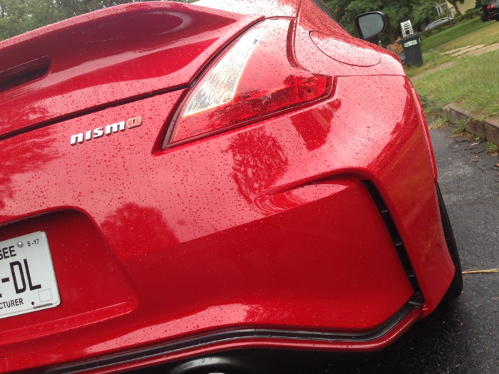 The rear tail lights echo the headlights, and you get a dash of Nismo badging.