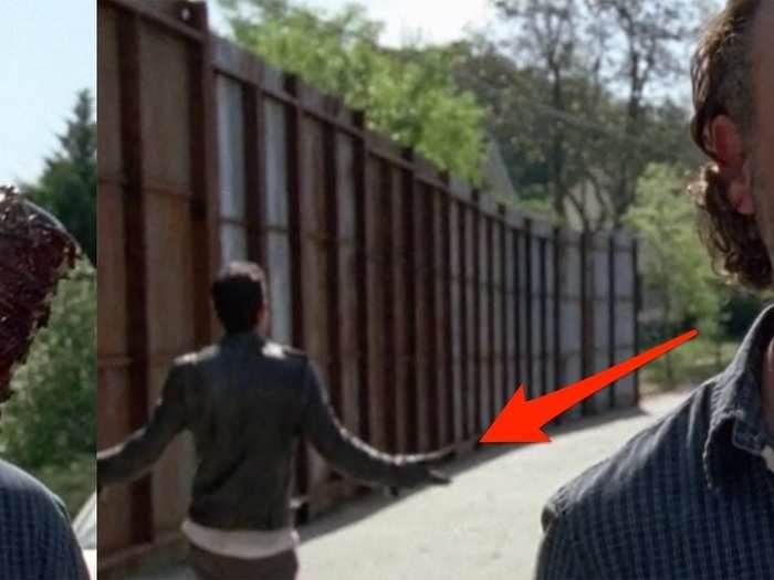 We see the same scene from a slightly different perspective, but still get Negan swinging his arms out in the background.