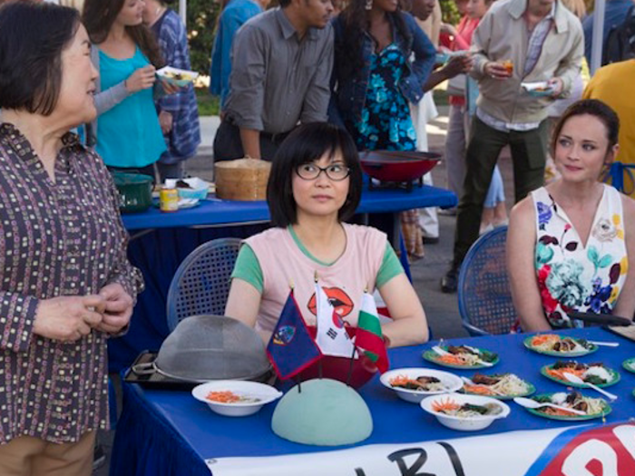 Lane still lives in Stars Hollow. Here she is volunteering with Rory with her mother watchfully standing by.