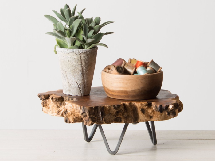 This wood slab pedestal adds interest and dimension to your tabletops. Add a plant or a candle for the ultimate finishing touch.