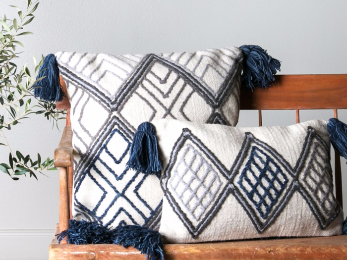 We love the navy tassels on these Soren Pillows.