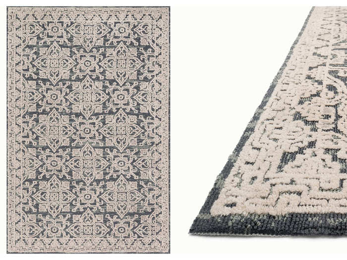 Joanna also designs rugs — we love the faded look of this grey and beige area rug.