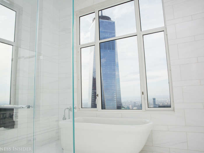 Here, you can keep an eye on the Freedom Tower right from your bath tub.