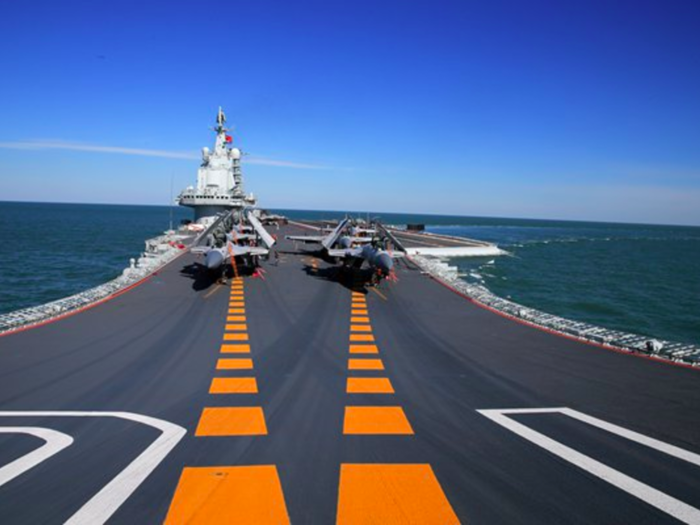 The Liaoning launches planes off a "ski-jump" style deck because it lacks the catapults that US carriers have.