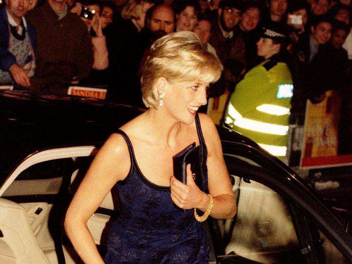 February 12, 1997:  Diana, Princess of Wales chose navy again for the Royal Gala Premiere performance of Lord Attenborough