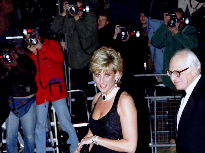 June 14, 1995: Navy seemed to be her colour in 1995, as she was seen wearing a similar gown at a gala charity dinner in June.