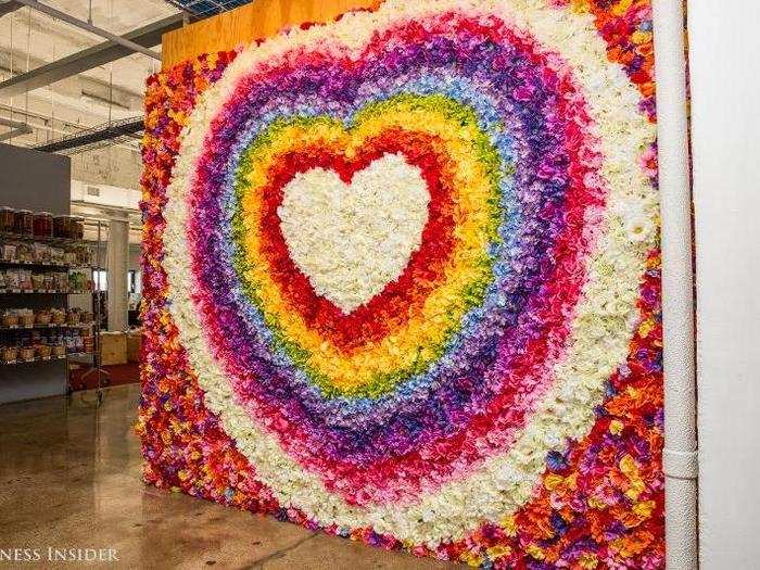 ... as does this colorful flower wall. "There’s a lot of art that’s influenced by openness, connectedness, and the company mission of connecting the world," Reynar says.