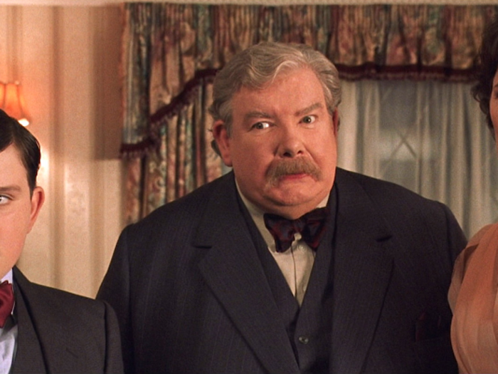 This one is a two-parter. Where does Vernon Dursley work, and what does the company produce?