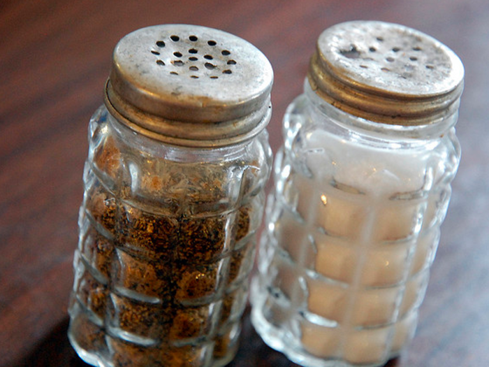 Salting food before tasting it.