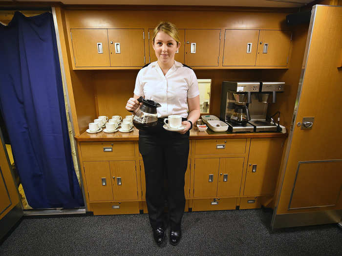 A steward in the wardroom on the Vigilant. The wardroom is the dining area reserved for naval commissioned officers.