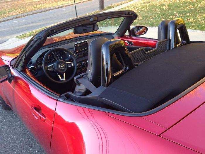 The cloth convertible top is a masterpiece of simplicity and function.