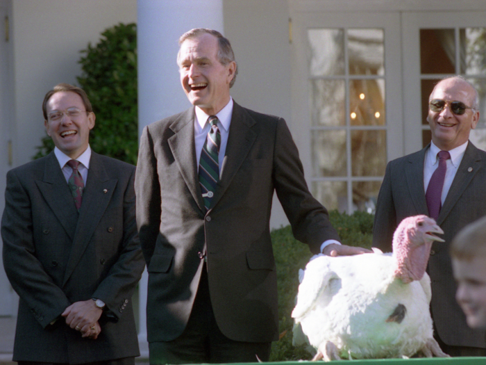 By 1989, the formality of the ceremony had solidified, and animal rights activists gathered outside the White House fences, chanting for President George Bush to "reprieve," "keep him going," or "pardon" the turkey. Bush obliged, and the turkey pardon has happened every year since.