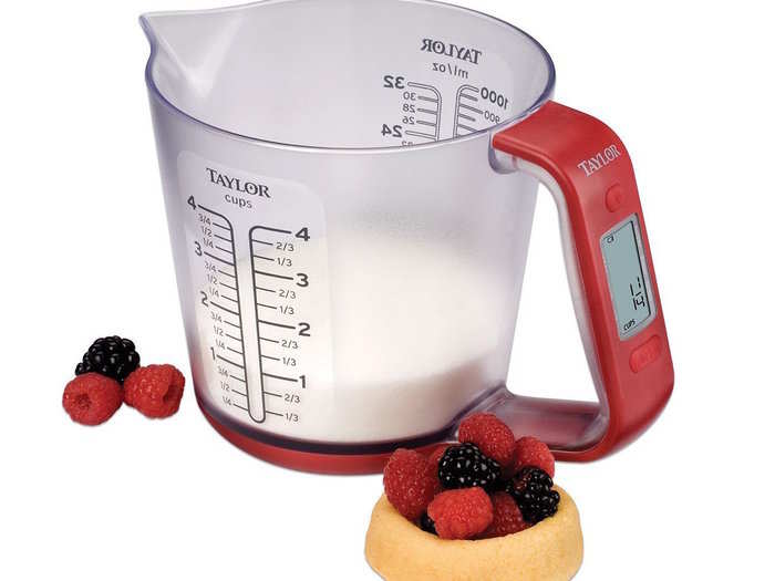 A measuring cup that automatically weighs and converts ingredients.