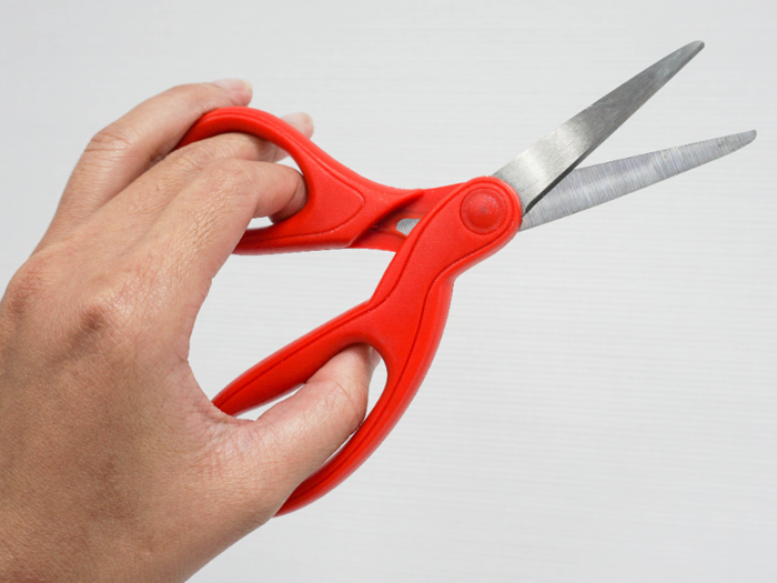 This is what it looks like when a lefty tries to use right-handed scissors.