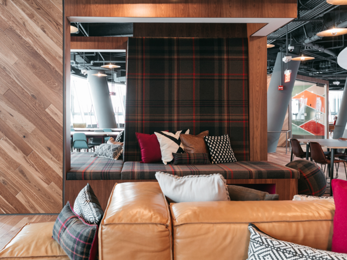 The plaid reading nook looks big enough to share — and very comfortable.