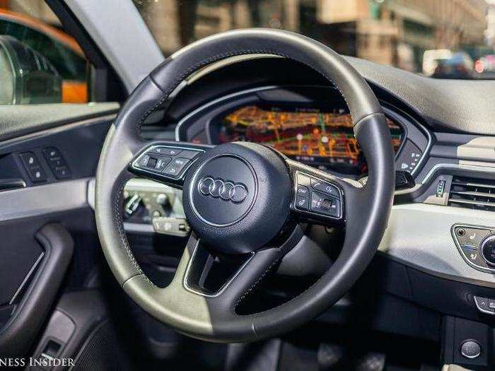 The 12.3 inch high-definition LCD is controlled via steering wheel-mounted buttons located to the right of the Audi logo.