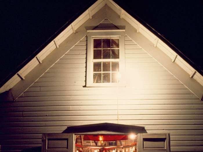 Wisconsin, 1977: Open doors of welcome invite revelers to a barn dance at Volksfest, an annual celebration of Swiss Independence Day in New Glarus, Wisconsin.