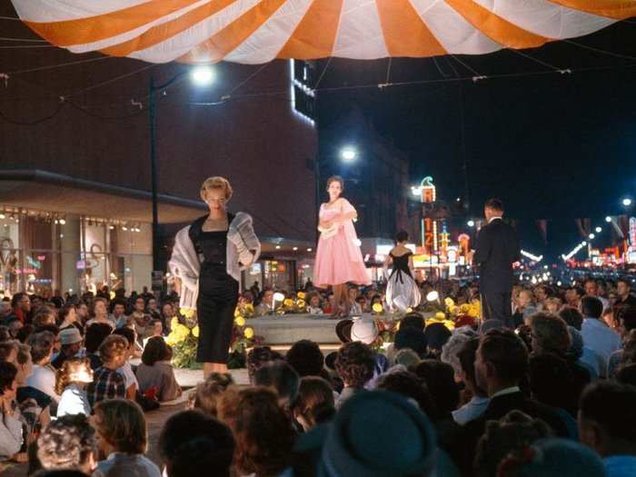 Washington, 1960: Couture al fresco, models promenade in a fashion show on Main Street, Spokane, Washington.