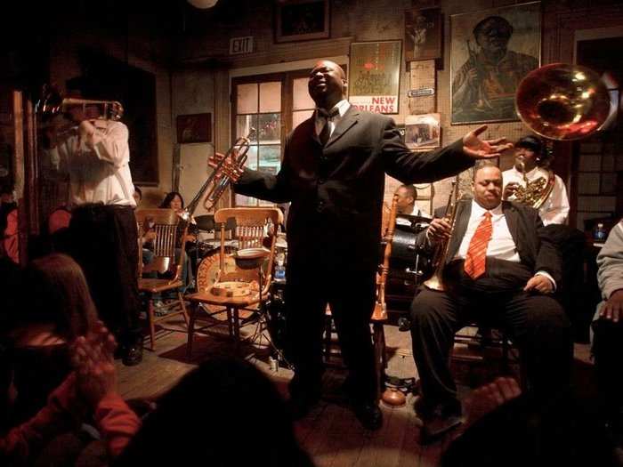 Louisiana, 2007: Trumpeter Kenneth Terry and the New Birth Brass Band play at Preservation Hall in Louisiana, two years after the devastation of Hurricane Katrina. "What we do in New Orleans you can