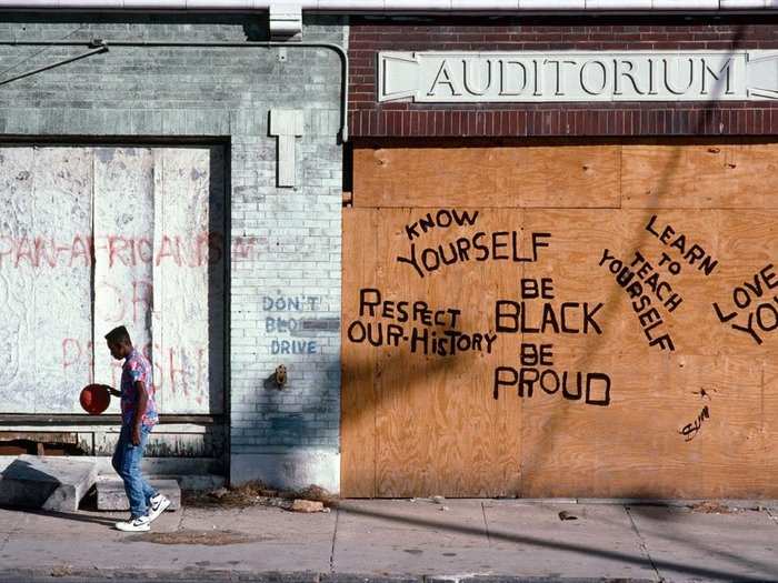 Georgia, 1988: Messages of positivity grace the streetscape in Sweet Auburn, Georgia, birthplace of Martin Luther King, Jr. and traditional center of Atlanta’s black community.