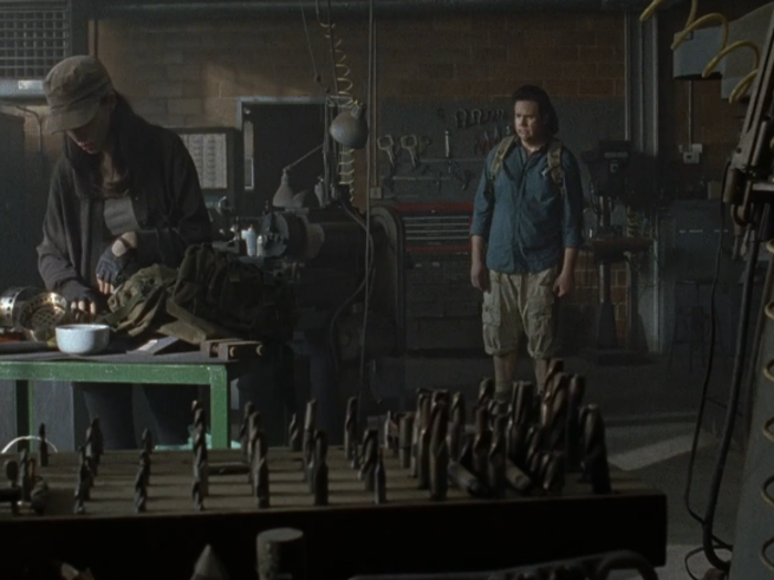 Eugene heads to a building with Rosita to make a bullet for her.