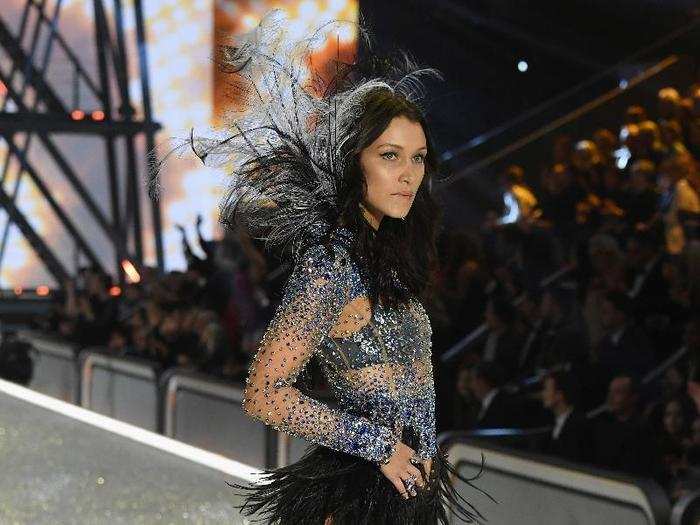 Bella Hadid got to wear this sparkly, feathery ensemble for her second look.