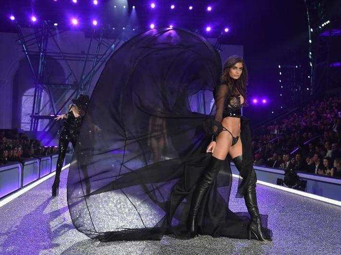 Lady Gaga changed for her second song into a black outfit. Taylor Hill wore a billowy cape.