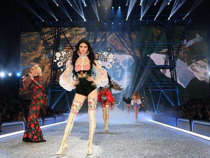 Flowers and thigh high stockings were everywhere for this segment, including on Sui He.