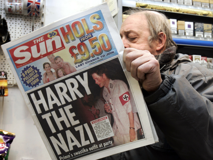 He was also photographed wearing a Nazi costume.