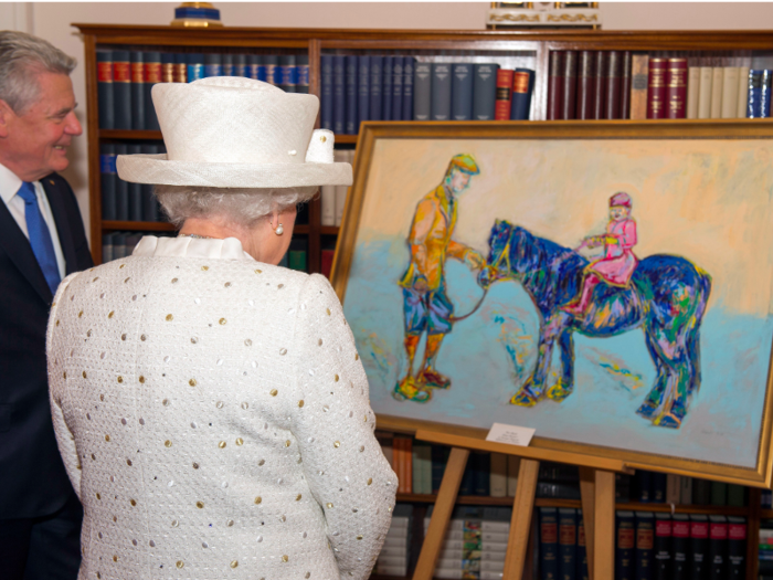 Germany, 2015: Nicole Leidenfrost painting. Last year, the President of Germany, Joachim Gauck, gave the Queen an acrylic painting of her and her father. Unimpressed, the Queen swung a proverbial haymaker, "it