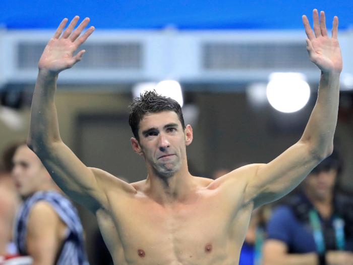 Michael Phelps of the USA reacts after the Men