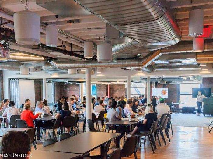 Every week, the entire office gathers to eat breakfast together and listen to presentations.