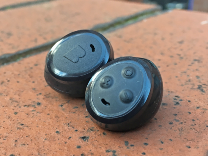 On the side of the right earbud is a trio of physical, multifunctional controls. These are much more convenient than futilely swiping a tiny touchpad, and don’t get thrown off by the wind to boot.