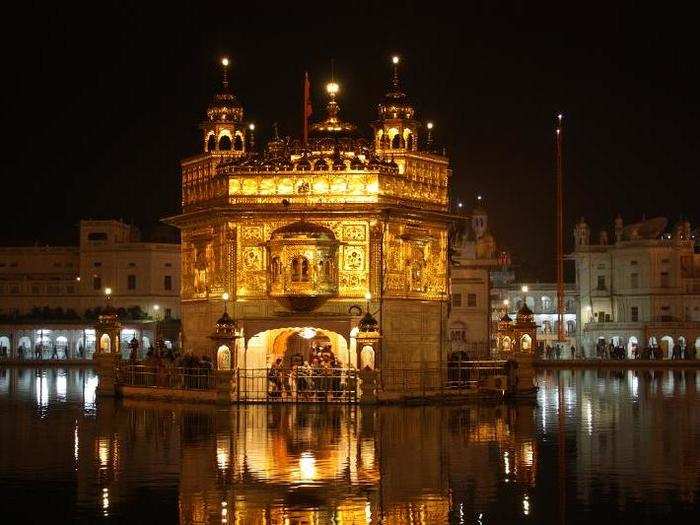 The Golden Temple in Amritsar, India is a stunning structure that seems to have been dropped right in the middle of the Amritsar river.