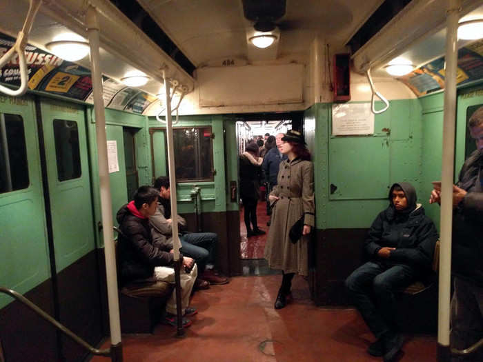 My final look into the train was perfectly representative of the bizarre mash-up of antique train cars with modern life: a woman, dressed in antique clothes, listening to music on her smartphone.