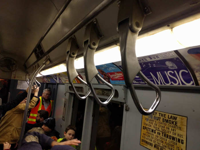 The "straps" were much newer, as was the lighting and the seats. This looked the closest to the modern NYC subway: