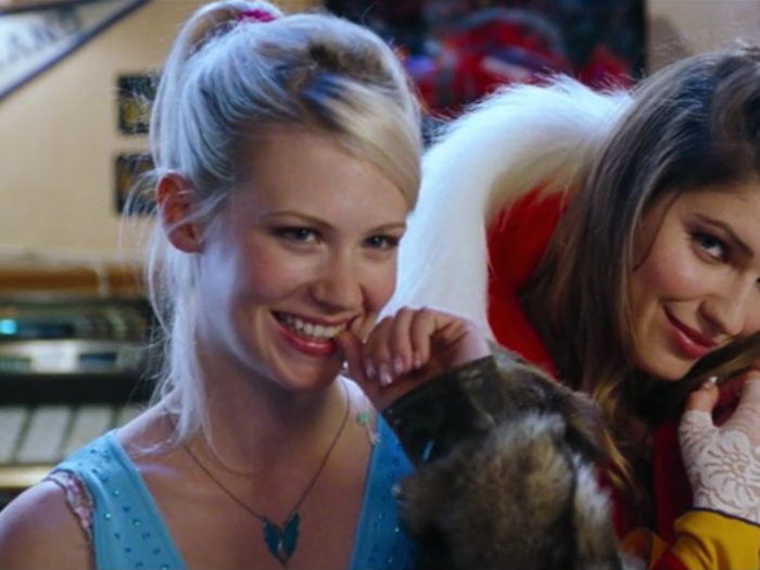 One of the smaller roles in "Love Actually" was the sexy Wisconsin sisters Colin met in a bar. The blonde, Jeannie, was actress January Jones.