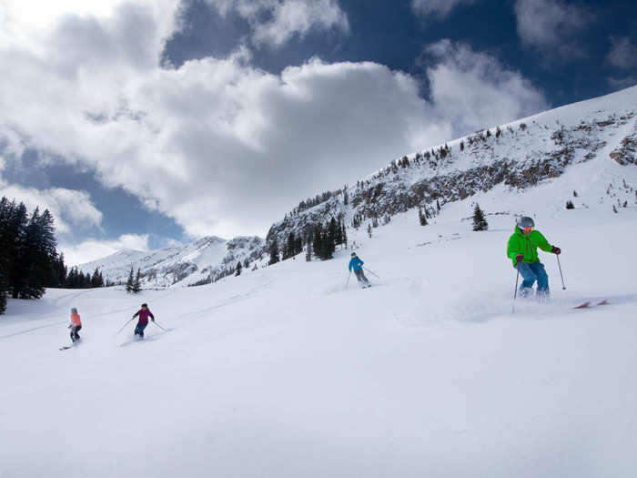 Adults can get ski or snowboarding lessons, too.