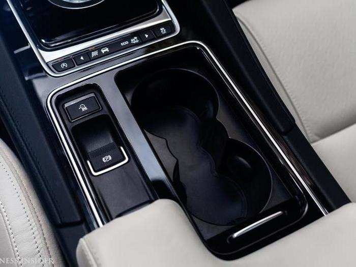 The all-important cupholders. Above, you have the driving-mode selector, which takes some getting used to. Basically, you