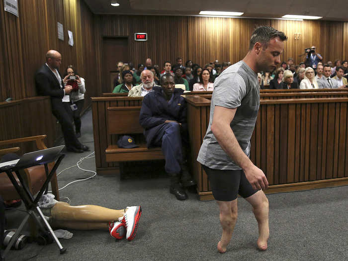 Olympic athlete Oscar Pistorius was made to remove his prosthetic legs mid-trial by his defence lawyer in a bid to prove he