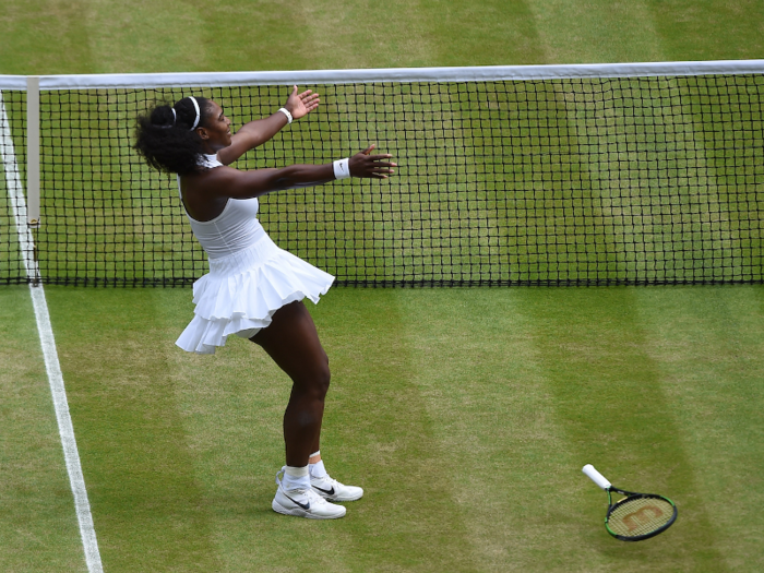 Serena Williams celebrates winning her seventh Wimbledon Title after beating Germany