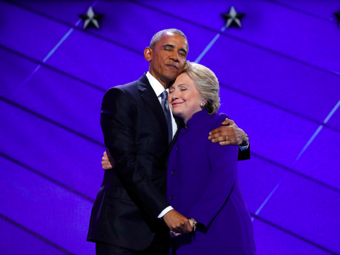 Democratic presidential nominee Hillary Clinton hugs US President Barack Obama as she arrives onstage at the end of his speech on the third night of the 2016 Democratic National Convention in Philadelphia.