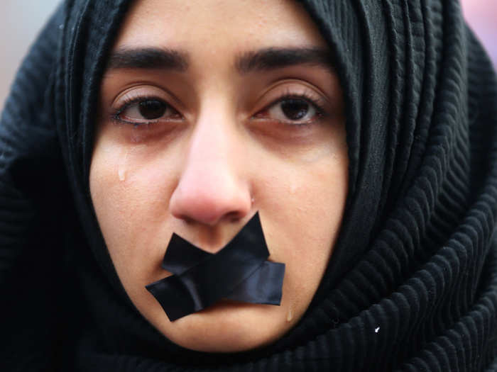 A Turkish student cries during a protest to show solidarity with trapped citizens of Aleppo, Syria, in Sarajevo, Bosnia and Herzegovina on December 14, 2016.