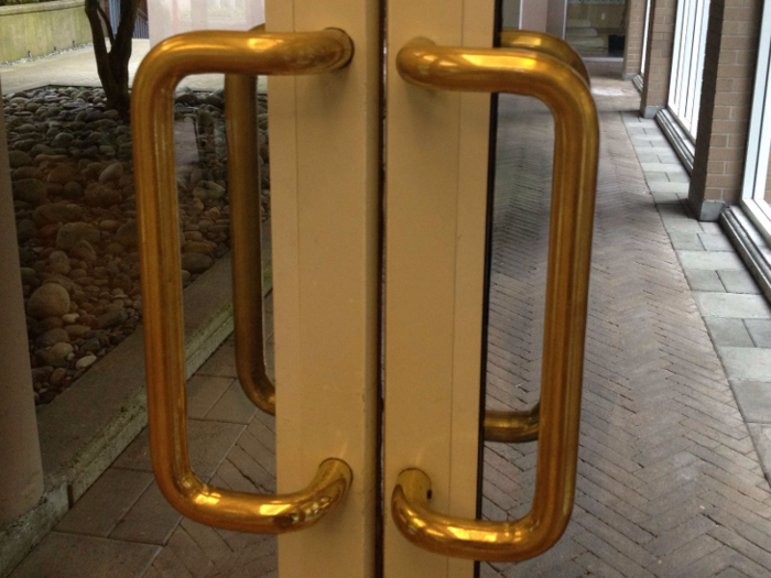 The quickest way to make someone look like a doofus is to install ambiguous handles on public doors. No matter whether you push or pull, you somehow always end up being wrong.