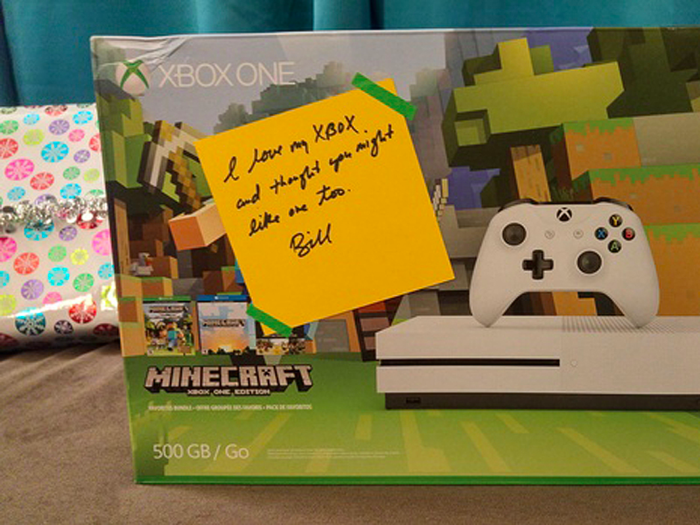 ... and it was a Xbox One Minecraft Edition with a handwritten note,"I love my Xbox and thought you might like one too." She writes, "Well yes, yes I would! And I do!"