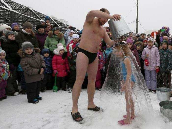 On Polar Bear Day, members held a flashmod at the Royev Ruchey Zoo, dumping ice-cold water on members