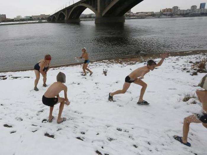 No beach volleyball here — just a snowball fight.