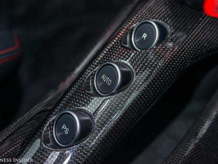 THE TRANSMISSION: "R" for reverse, "Auto" to switch off the full manual mode on the dual-clutch gearbox, and "PS" ("Partenza Sportiva"), a performance-start mode that prevents wheelspin on quick launches.